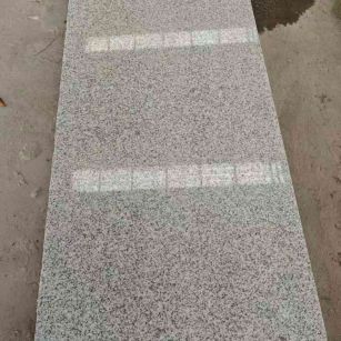 太原芝麻白光面毛板